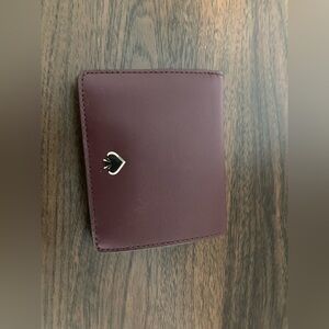 Kate Spade Nadine small bifold wallet leather maroon purple red card holder snap